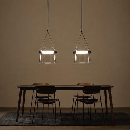 Bolla glass pendant light dining table bar top illuminated warm glow glass leather strap American home lifestyle interior styled