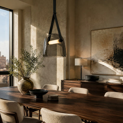 Bolla glass pendant light dining table bar top illuminated warm glow glass leather strap American home lifestyle interior styled