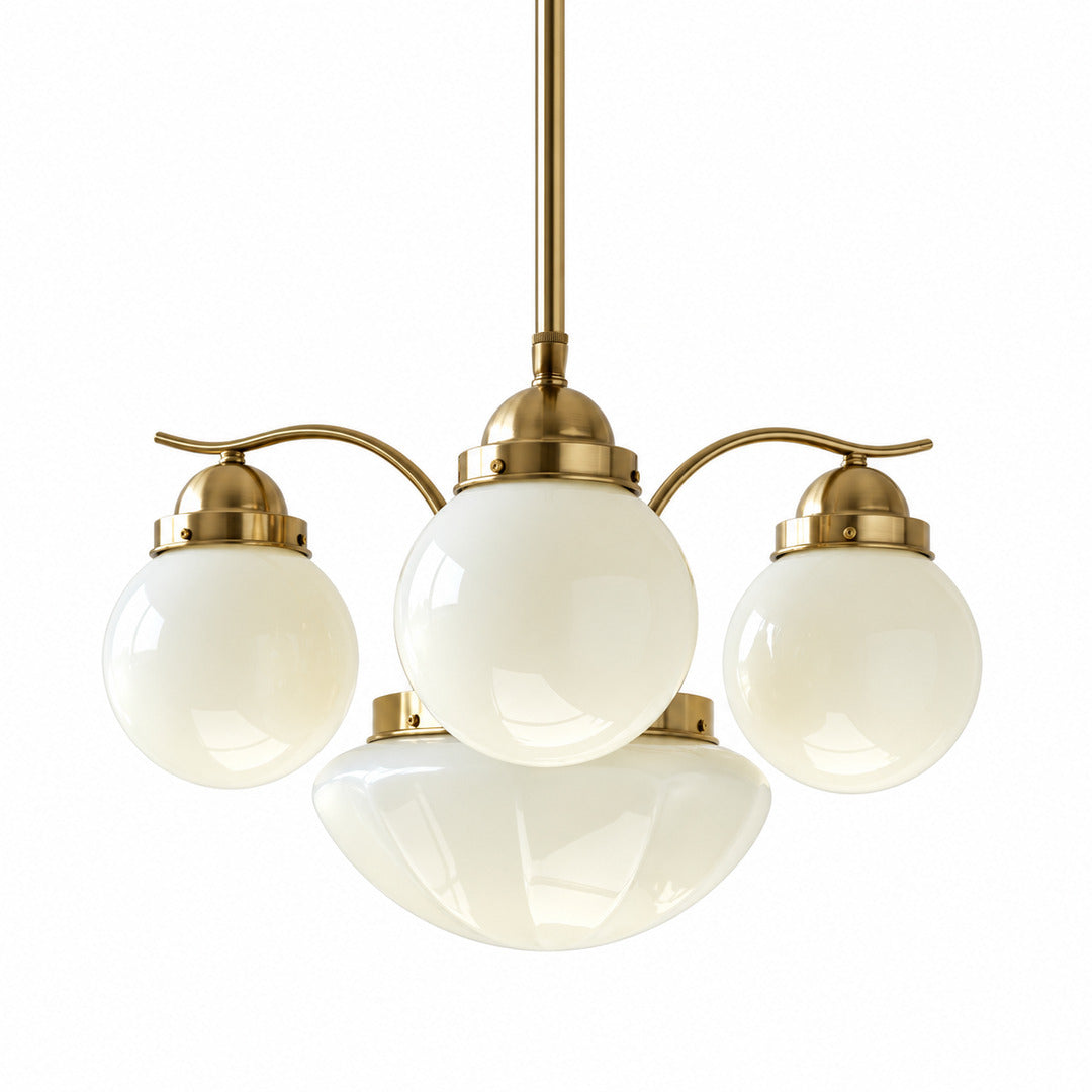 Four-light gold and beige Bolla globe glass chandelier in a warm mid-century dining room