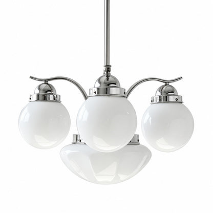 Four-light chrome and white Bolla globe glass chandelier over a round dining table