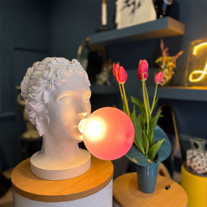 Bolla table lamp Woman boutique retail store display counter accent white resin pink bubble pop art sculptural whimsical statement upscale conversation starter lifestyle interior
