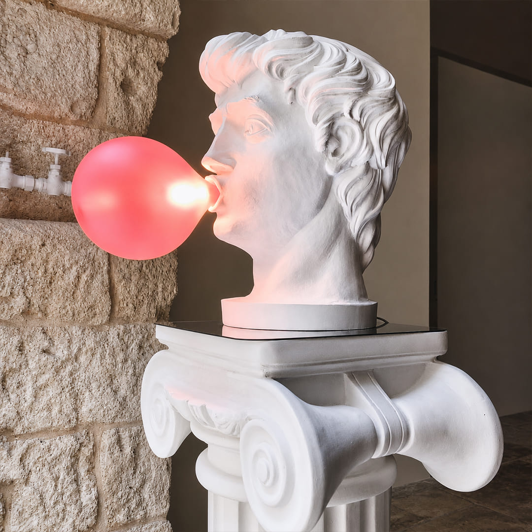 Bolla table lamp Man modern library home studio artistic desk accent white resin pink bubble pop art sculptural whimsical creative intellectual conversation starter lifestyle interior American home