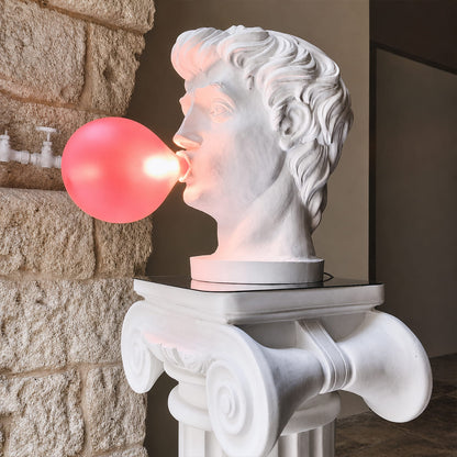Bolla table lamp Man modern library home studio artistic desk accent white resin pink bubble pop art sculptural whimsical creative intellectual conversation starter lifestyle interior American home