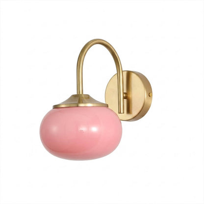 Bonbon wall sconce antique brass bow pink glass globe vintage white background