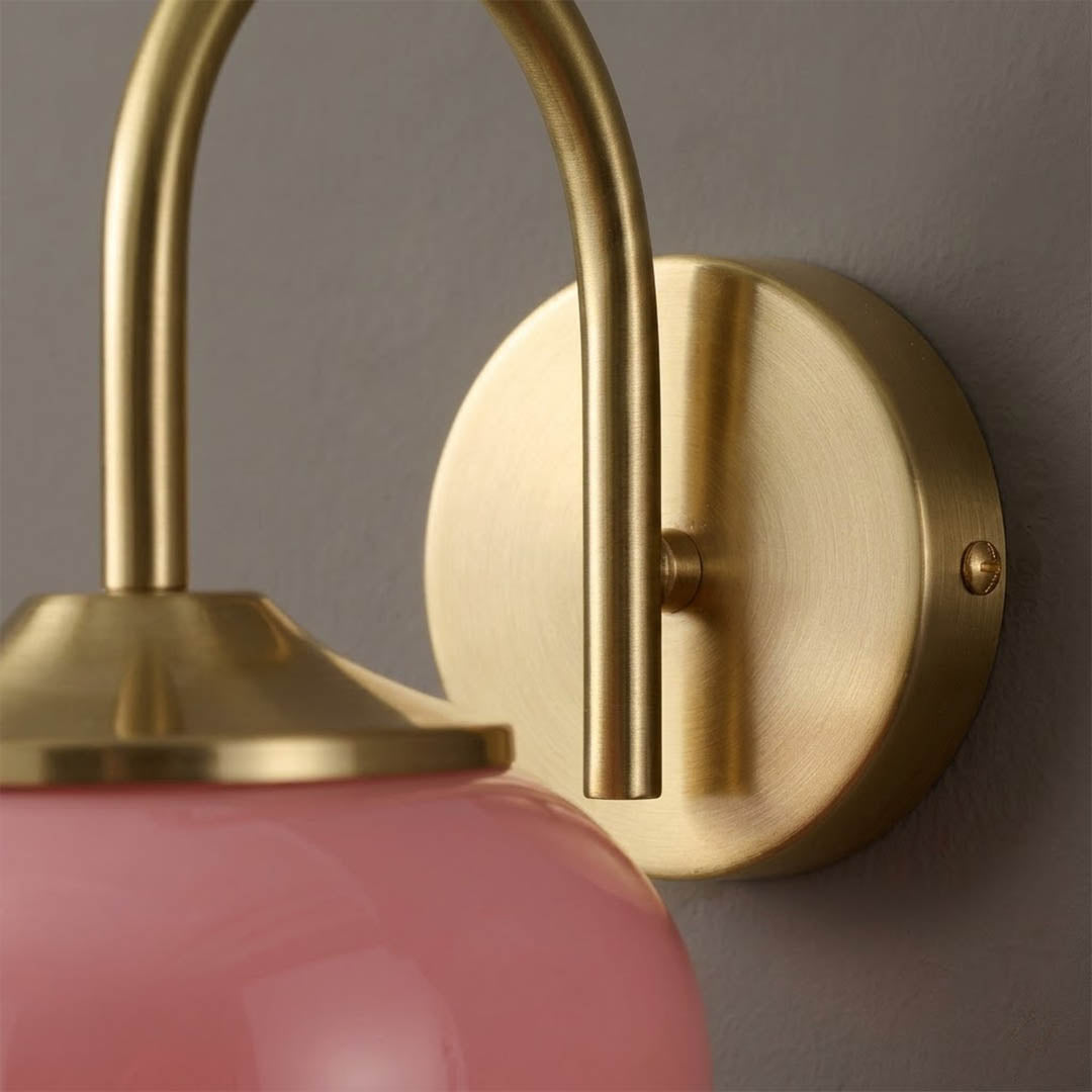 Bonbon wall sconce antique brass bow decorative detail close up vintage