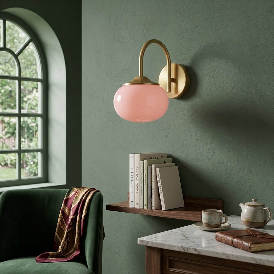 Bonbon wall sconce antique brass bow decorative detail close up vintage