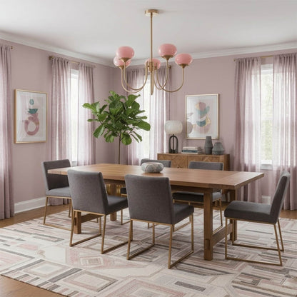 Bonbon glass globe chandelier above dining table warm glow modern interior