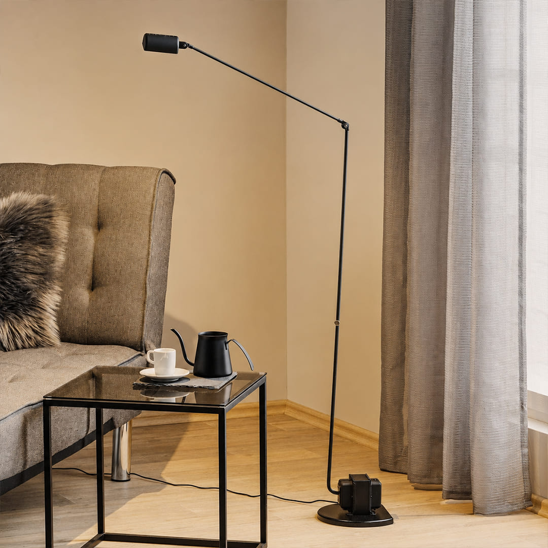 Braccio floor lamp black modern living room reading armchair beside side accent Italian swing arm 35.8 inch retro industrial reading warm ambient sophisticated lifestyle interior American home