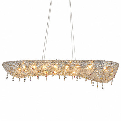 Brina flush mount crystal chandelier with clear crystal beads on a chrome frame sparkling over a dining table
