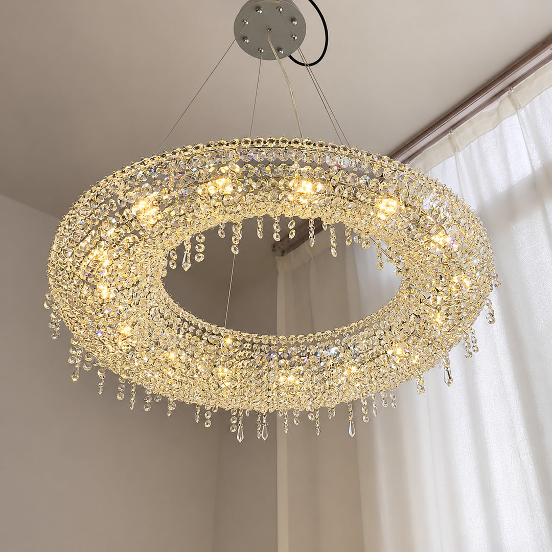 Brina crystal chandelier welcoming guests in an entryway