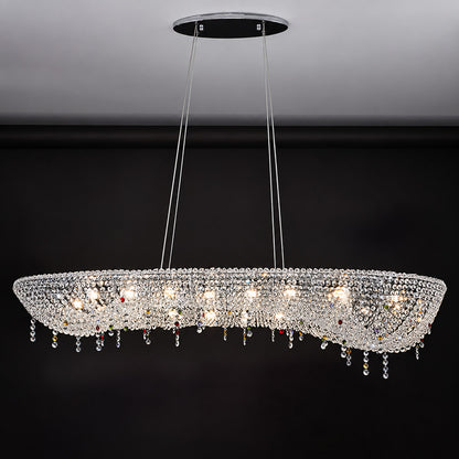 Warm light sparkling through hundreds of crystal beads on the Brina chandelier