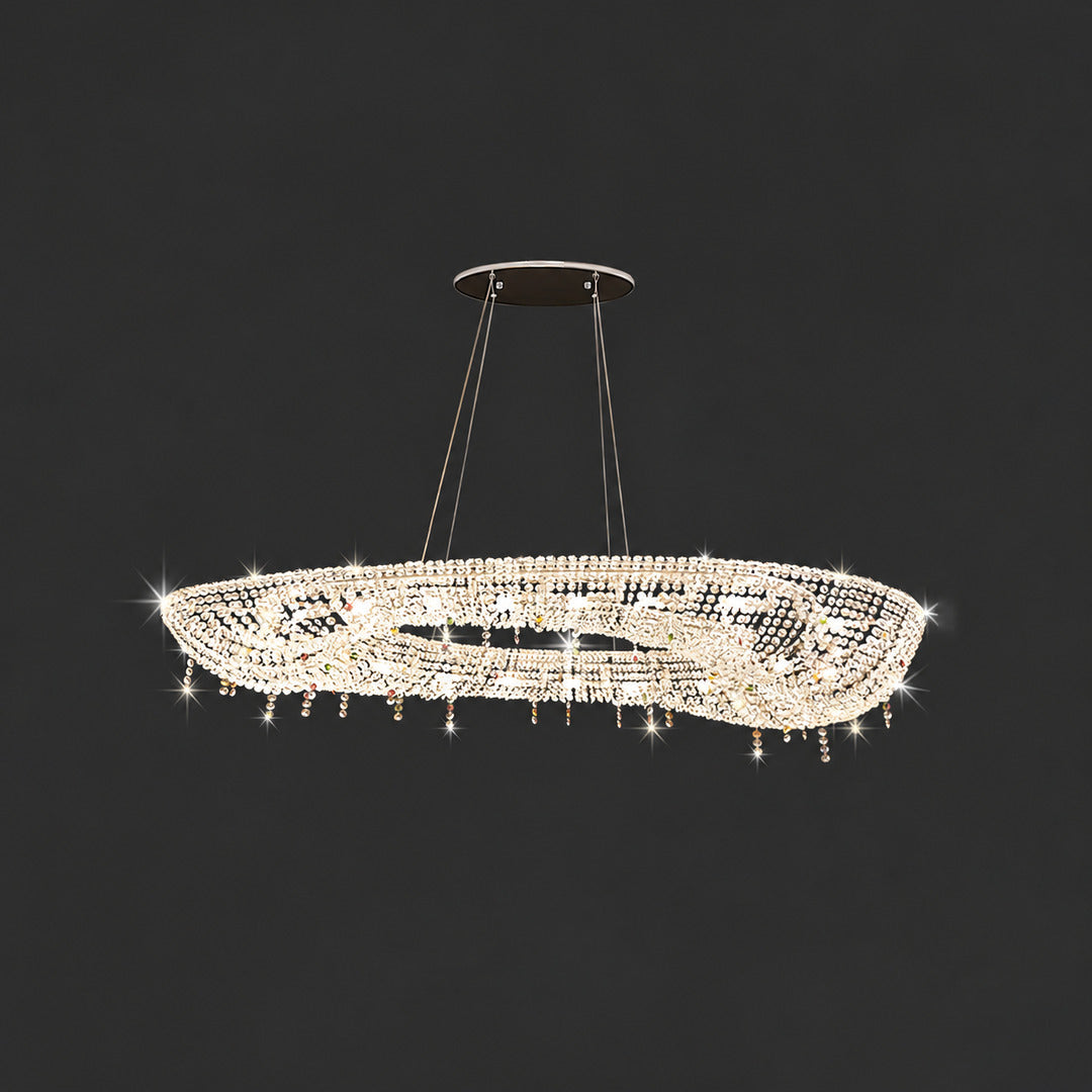 Round 23.6-inch Brina flush mount crystal chandelier in a bedroom