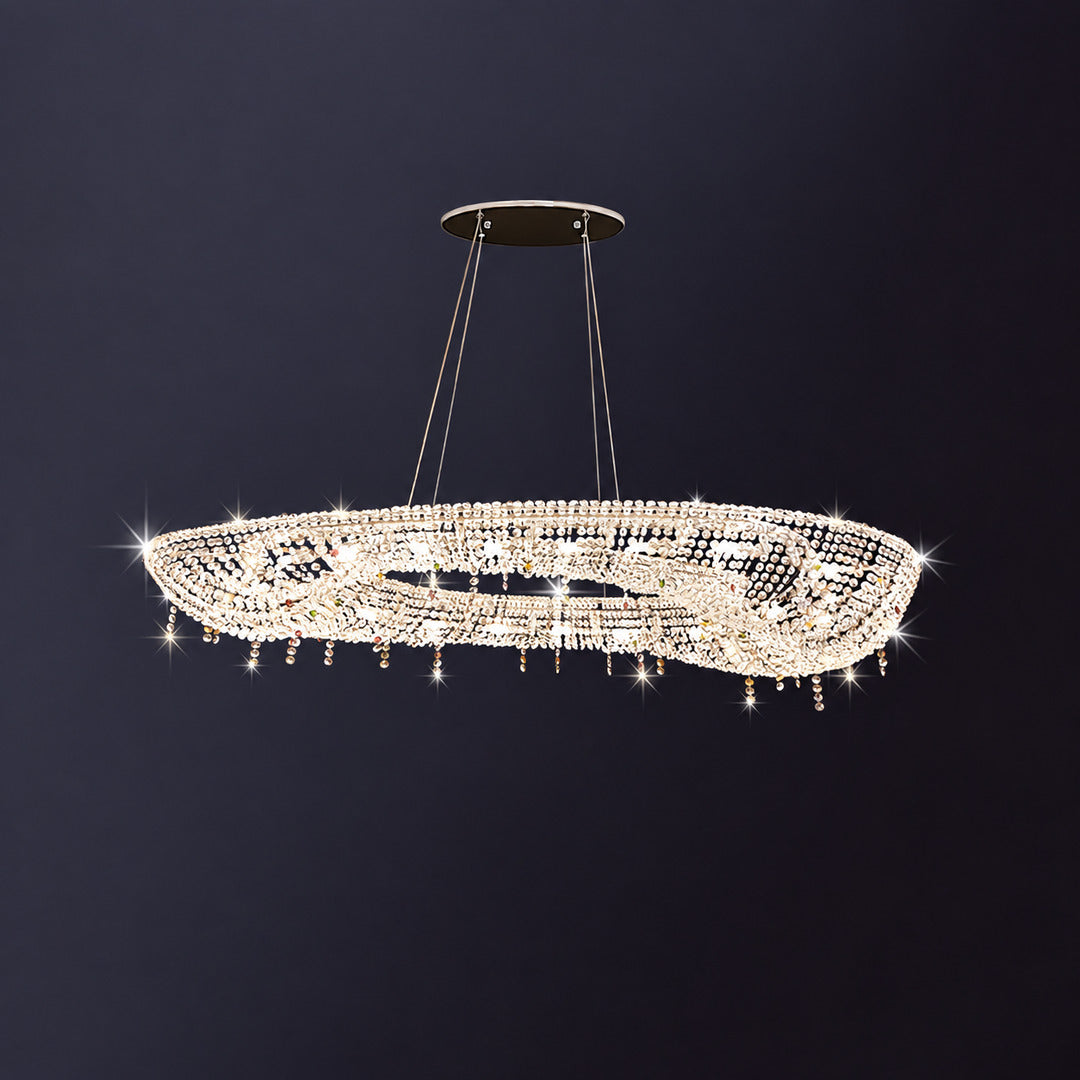 Round 31.5-inch Brina flush mount crystal chandelier over a round dining table