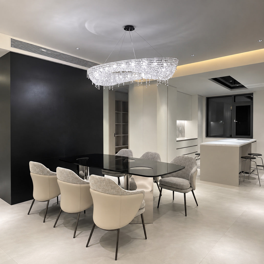 Brina crystal chandelier adding sparkle above a formal dining room