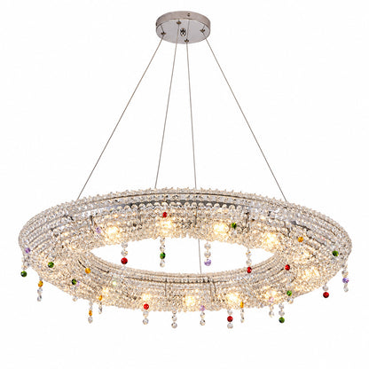 Oval 39.4-inch Brina crystal chandelier over a rectangular dining table