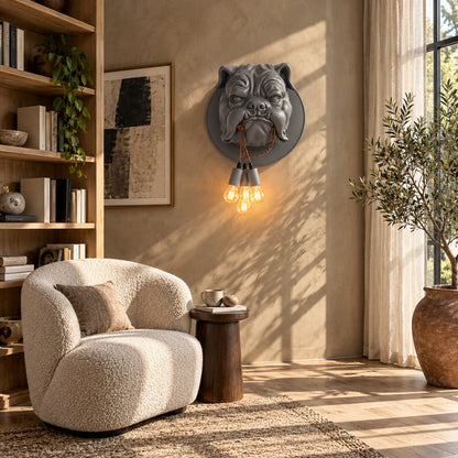 Bulldog wall sconce adding a quirky warm accent beside a reading chair