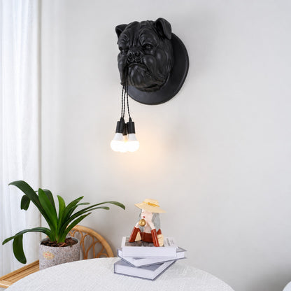 Bulldog wall sconce adding a quirky warm accent beside a reading chair