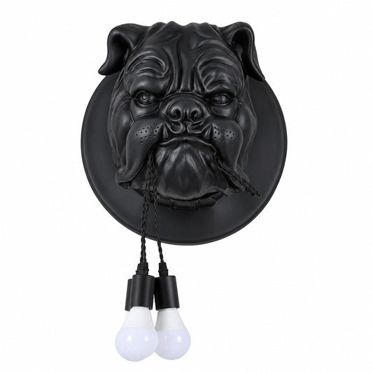 Bulldog wall sconce with a resin bulldog bust holding a cluster of glowing bulbs mounted on a wall