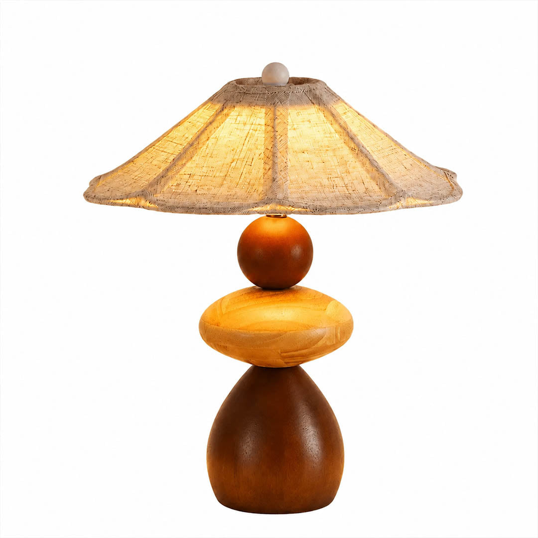 Cairn wood table lamp small stacked solid wood pebble forms pleated linen shade natural japandi white background front view