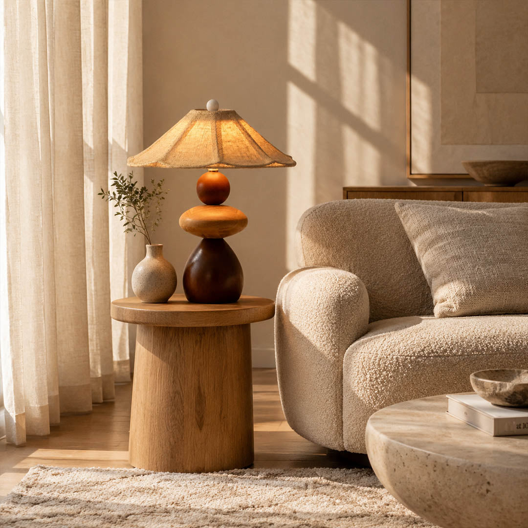 Cairn wood table lamp living room side table stacked wood linen shade warm glow natural modern American home lifestyle interior styled