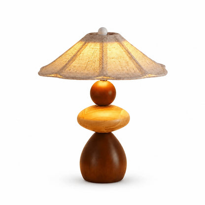 Cairn wood table lamp large stacked solid wood pebble forms pleated linen shade natural japandi white background front view