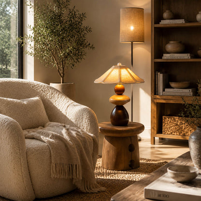 Cairn wood table lamp living room side table stacked wood linen shade warm glow natural modern American home lifestyle interior styled
