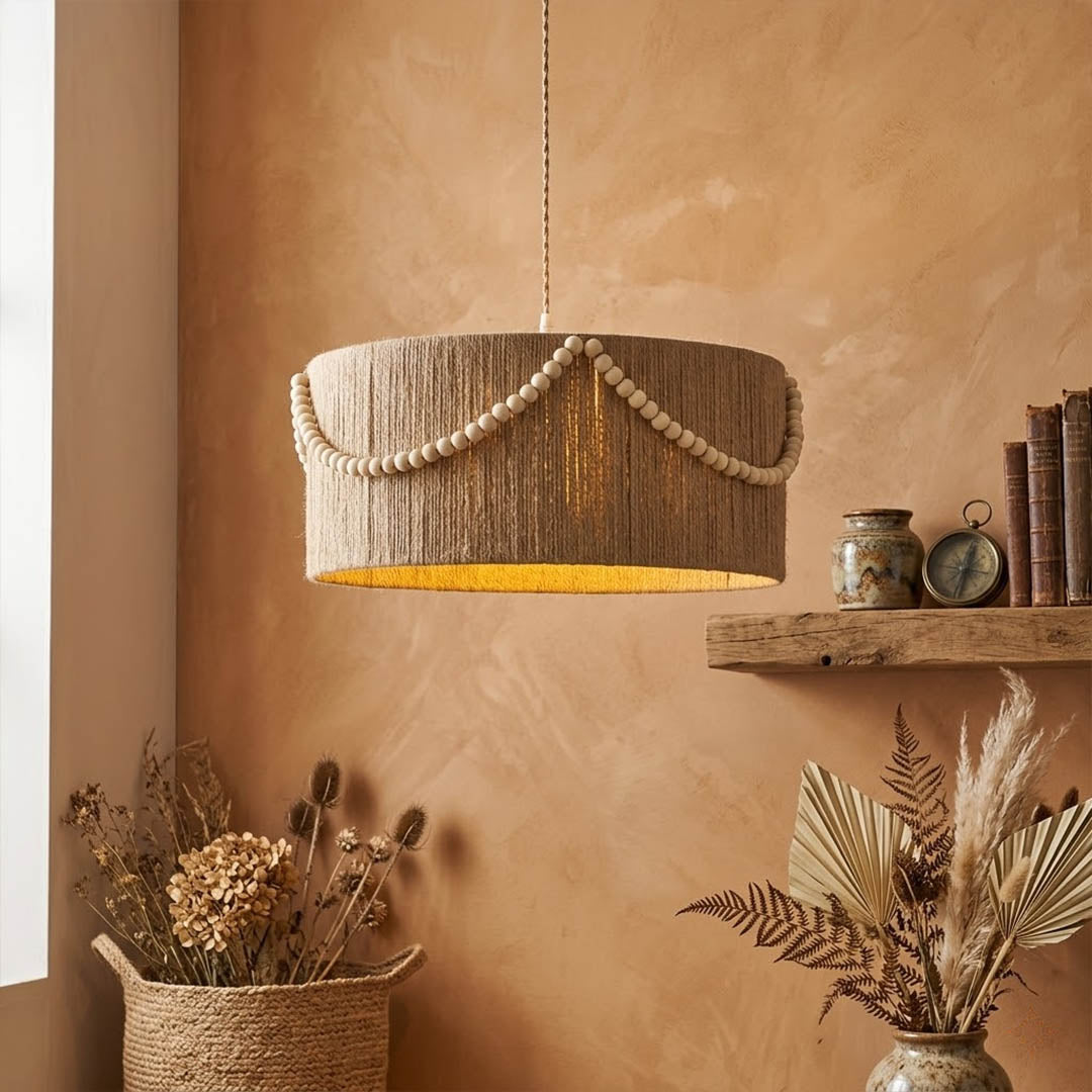 Cairo metal lantern pendant light above dining table vintage boho interior warm glow