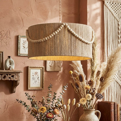Cairo metal lantern pendant light above dining table vintage boho interior warm glow