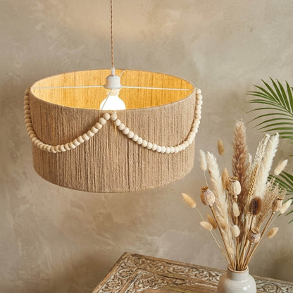 Cairo metal lantern pendant light above dining table vintage boho interior warm glow