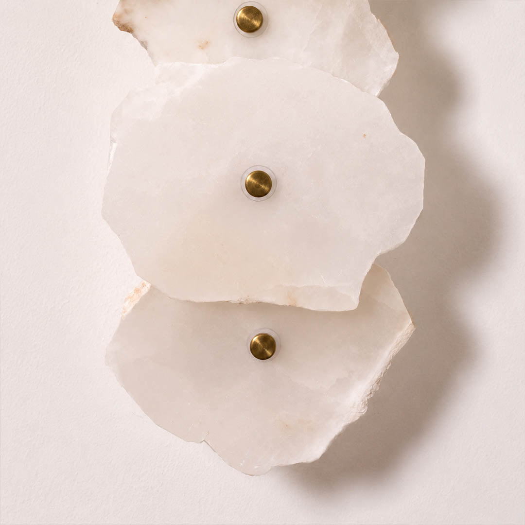 Calcaria alabaster wall light dome stone head shade detail close up natural translucent sculptural