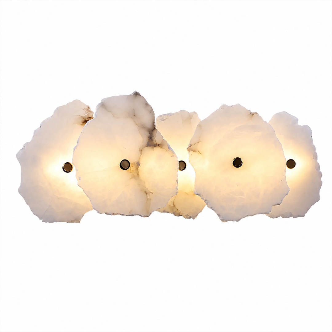 Calcaria alabaster wall light illuminated glowing veining warm soft radiance translucent stone detail close up quiet luxury