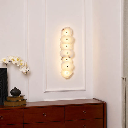 Calcaria alabaster wall light entryway foyer natural stone gold warm welcoming modern American home lifestyle interior styled