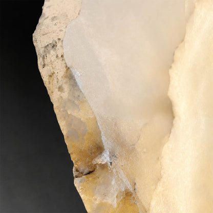 Calcaria alabaster wall light natural stone organic veining unique pattern detail close up translucent craftsmanship