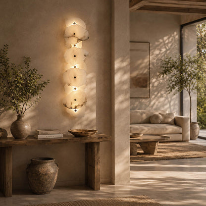 Calcaria alabaster wall light entryway foyer natural stone gold warm welcoming modern American home lifestyle interior styled