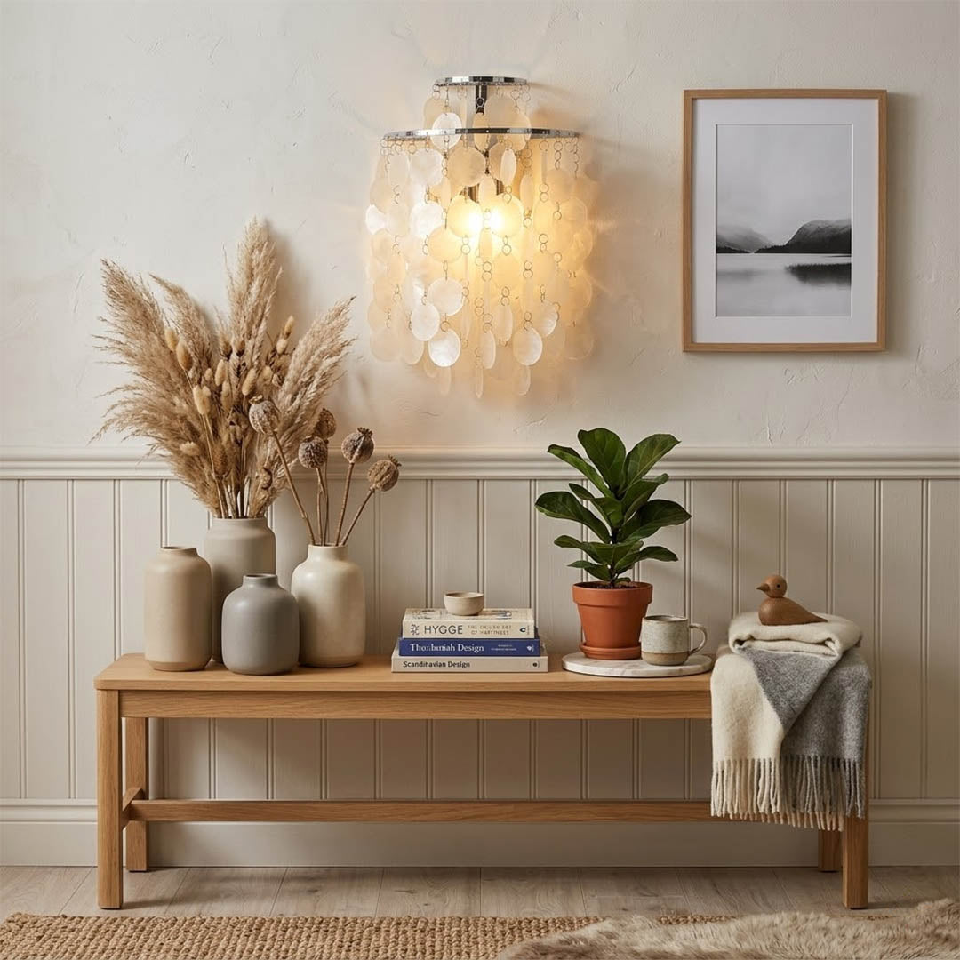 Calia Gold 15 inch FUN WM style shell wall sconce staircase wall accent paired with Coralia chandelier coastal Mid Century designer warm glow lifestyle interior