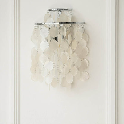 Calia Gold 15 inch FUN WM style shell wall sconce staircase wall accent paired with Coralia chandelier coastal Mid Century designer warm glow lifestyle interior