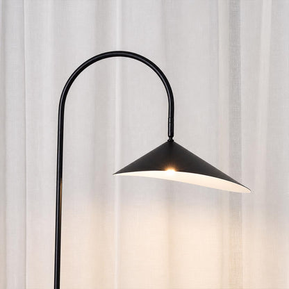 Calla floor lamp illuminated warm soft even glow matte interior calla lily shade evening cozy ambient mood detail close up