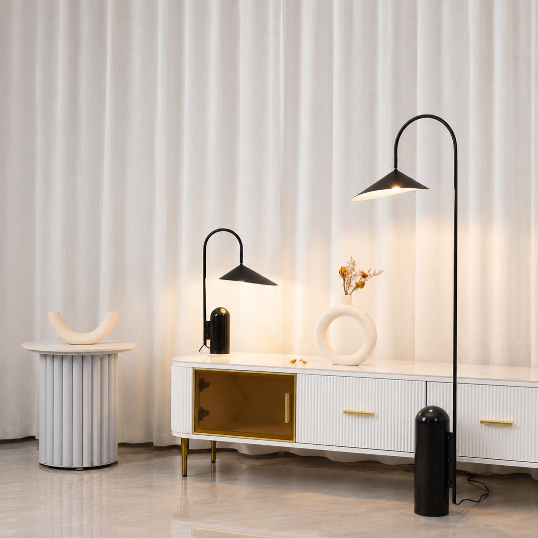 Calla floor lamp beside tv media room adjustable directional light reducing screen glare marble base reading American home lifestyle interior