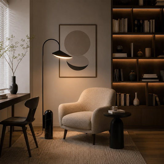 Calla floor lamp beige reading corner beside armchair adjustable calla lily shade warm cozy marble base American home lifestyle interior