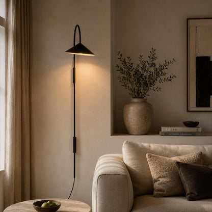 Calla plug-in wall sconce black living room beside sofa adjustable arm reading light modern minimalist marble American home lifestyle interior
