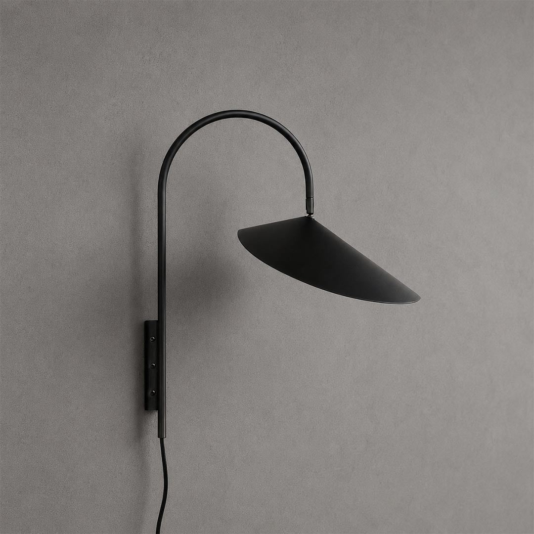 Calla plug-in wall sconce black adjustable metal arm marble base modern minimalist short bedside white background front view