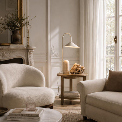 Calla table lamp beige reading corner beside recliner armchair adjustable petal shade marble warm cozy American home lifestyle interior