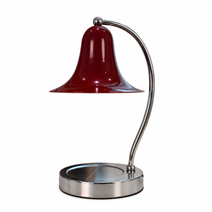 Red Campana candle warmer lamp as a warm accent melting a candle on a living room shelf