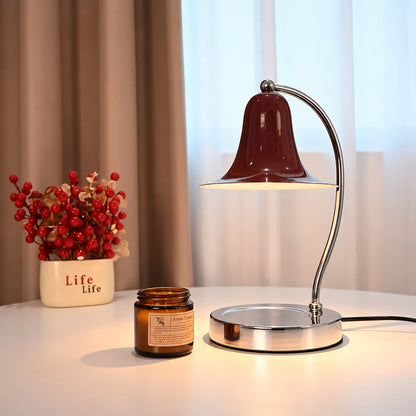 Campana candle warmer lamp creating a cozy scented atmosphere in a corner reading nook