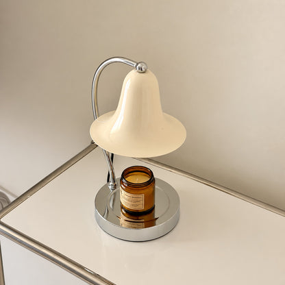 Campana candle warmer lamp welcoming guests with a warm scent on an entryway console