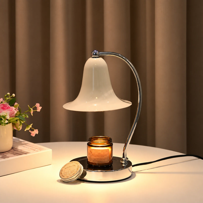 Campana candle warmer lamp warming a candle on a home office desk for a calming scent