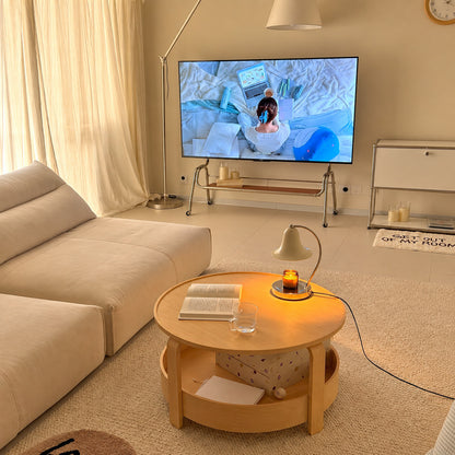 Campana candle warmer lamp as a flameless scent diffuser on a living room side table