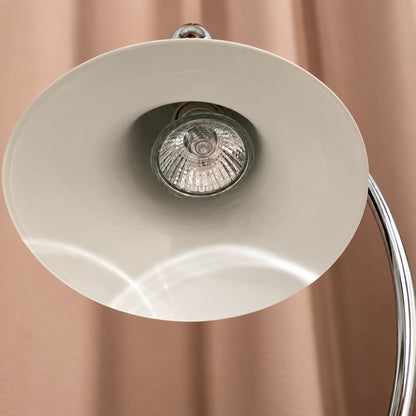 Close-up of the bell-shaped wrought-iron shade on the Campana candle warmer lamp