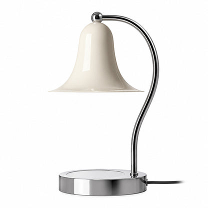 Campana candle warmer lamp with a cream bell-shaped shade melting a scented candle on a chrome base