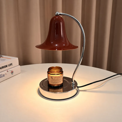 Campana candle warmer lamp melting a jar candle from above with a warm glow and no flame